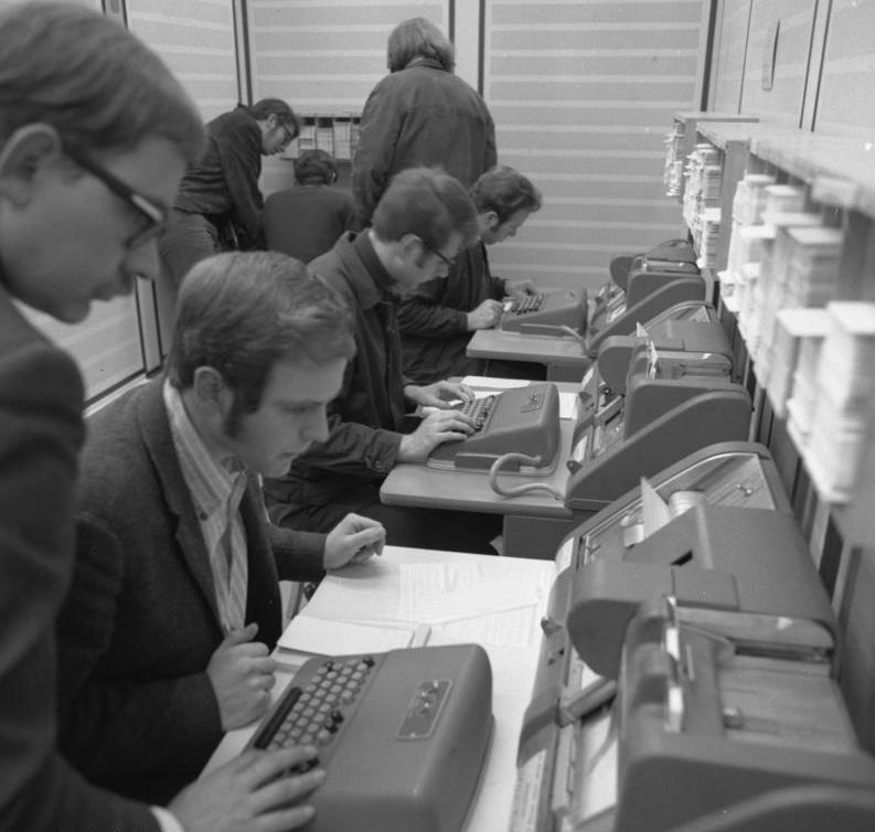 Punched Cards being written by students usign a IBM 026 keypunches
